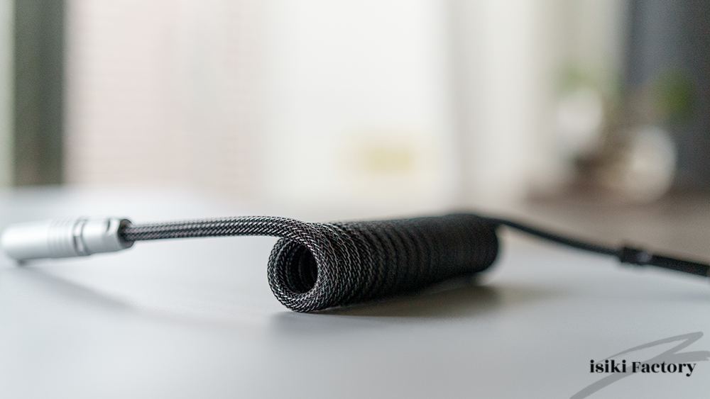 コイル部が伸び縮み